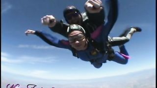 Sexy shemale skydiver jumps from an airplane for the first time
