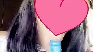 Adorable Natalie Okan sucking a blue vibrator.