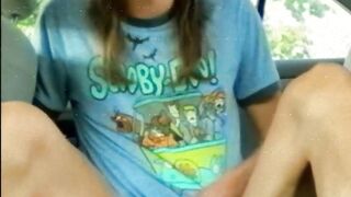 tgirl plays with her girldick in a car