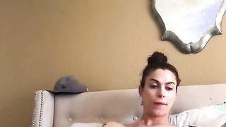 Soloing amateur transsexual with perky tits shows her body